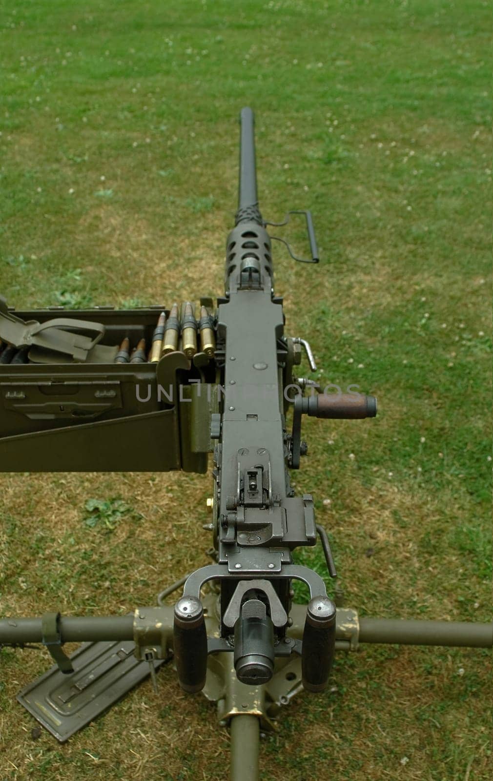 heavy military machine gun and ammunition box
