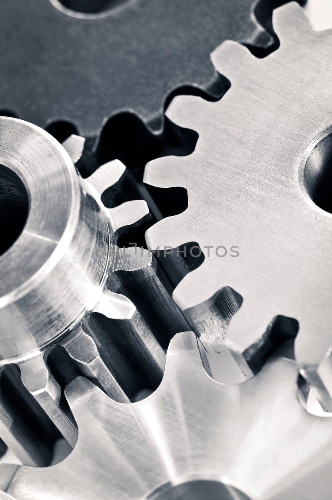 Industrial metal gears and machine parts connected