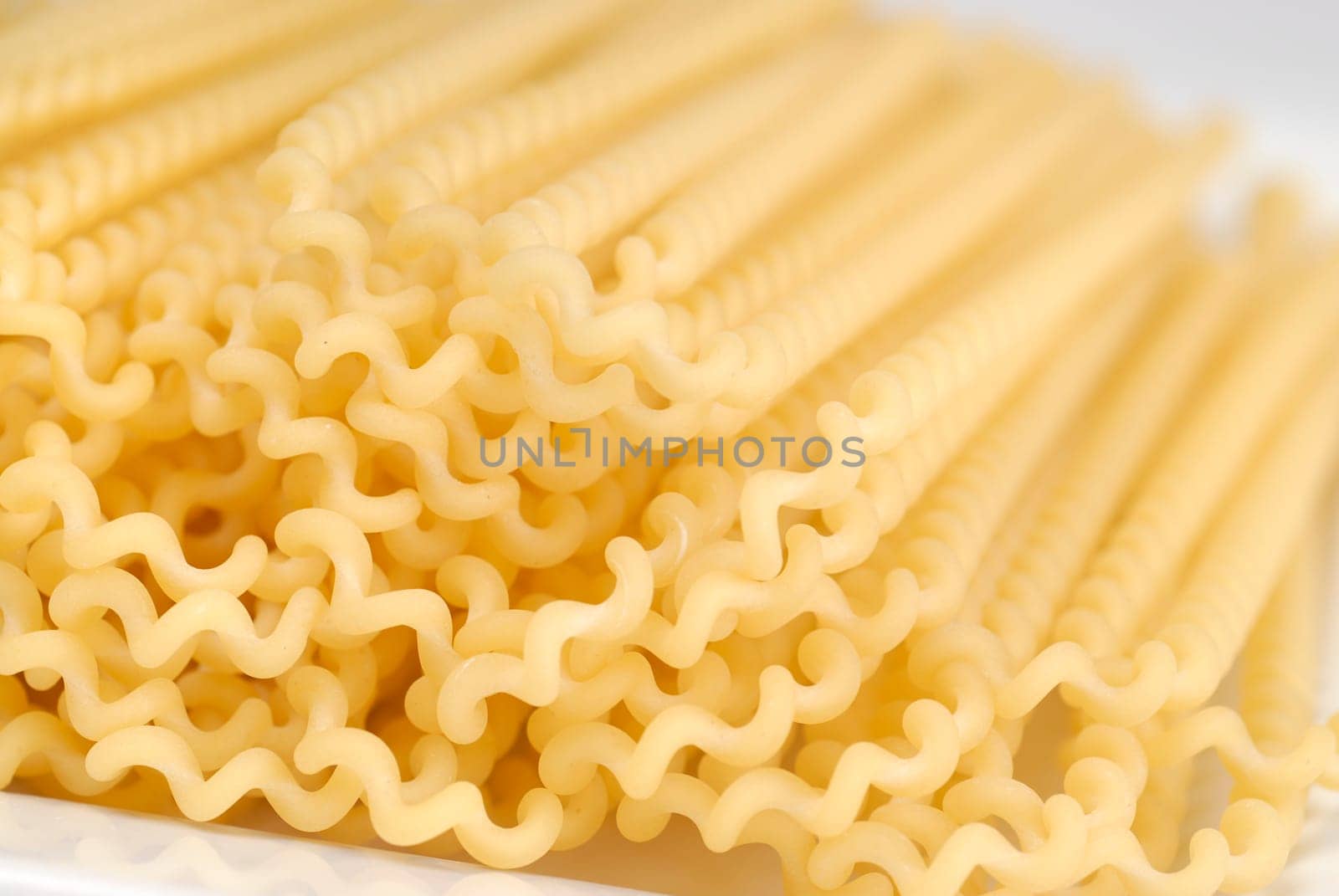 raw pasta on the white table