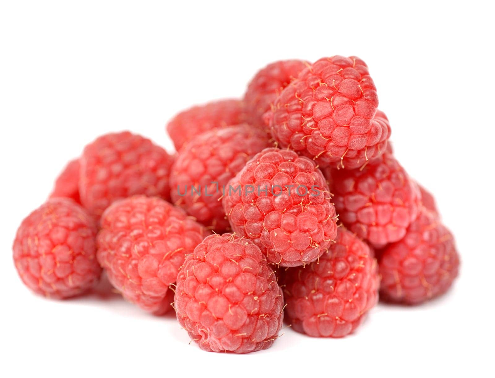 fresh ripe raspberry on the white background