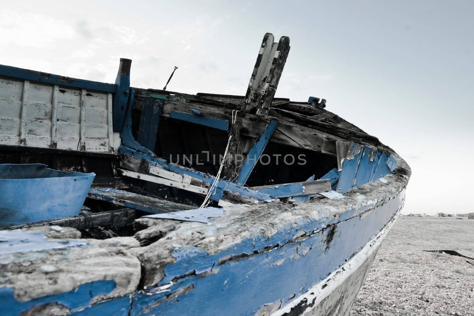 Old boat laying on land