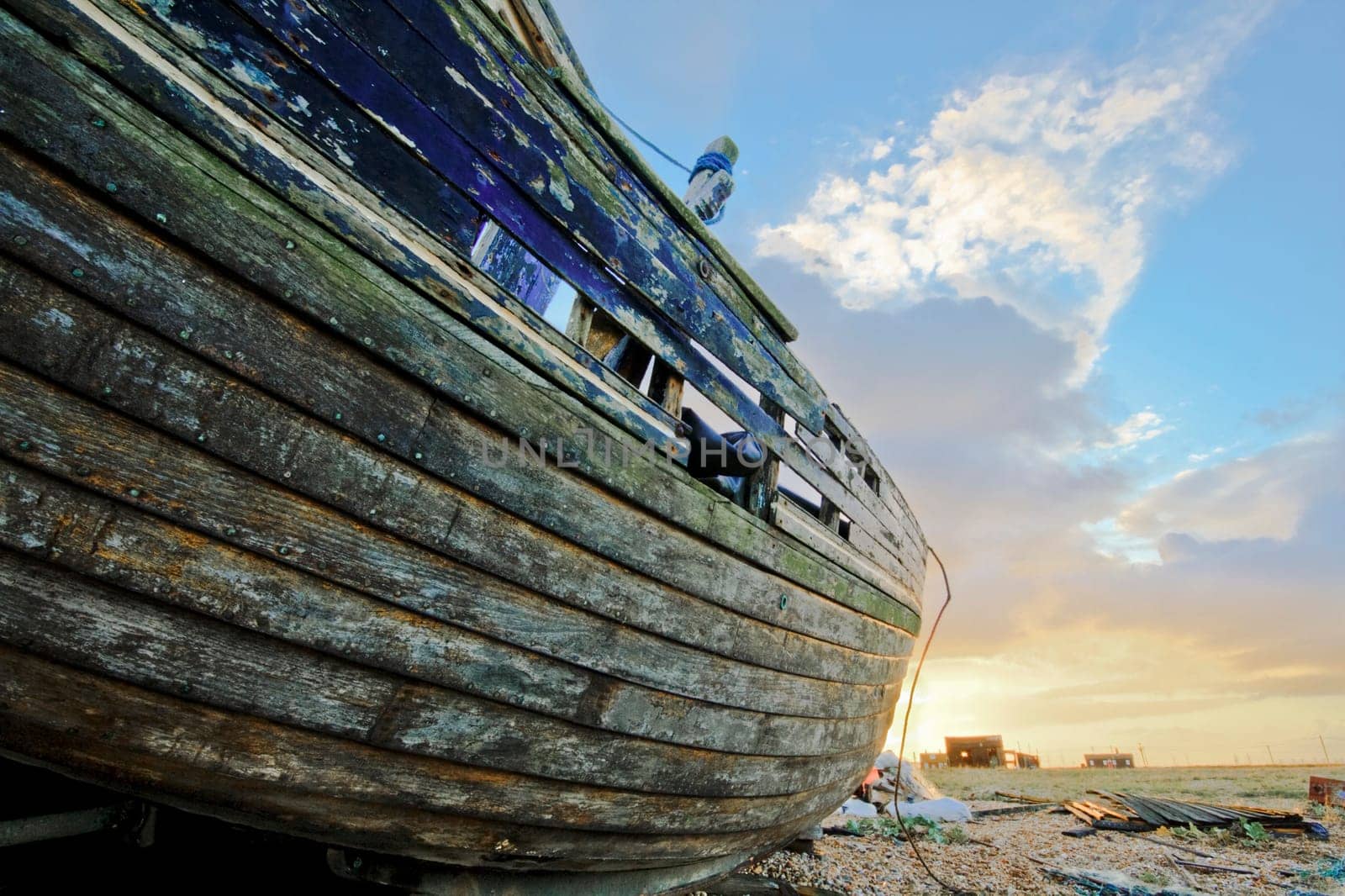Old boat laying on land