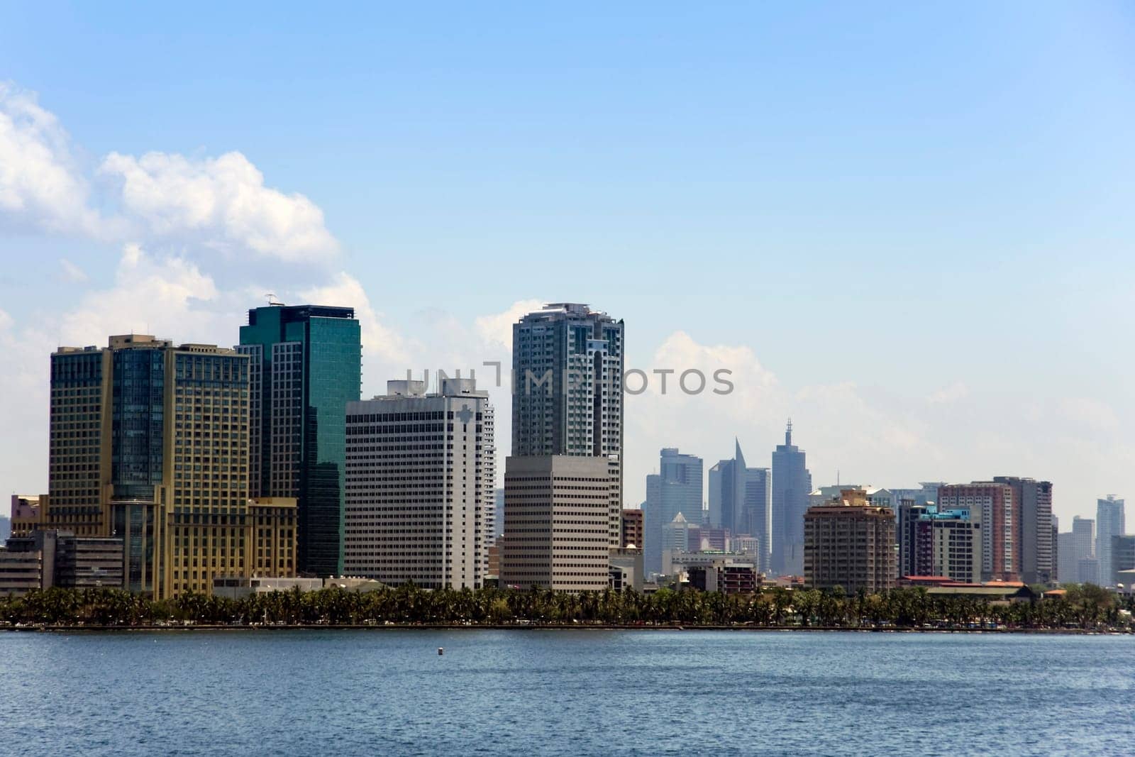 high rise condominiums lining manilas baywalk and ermita waterfront districts seen from manila bay