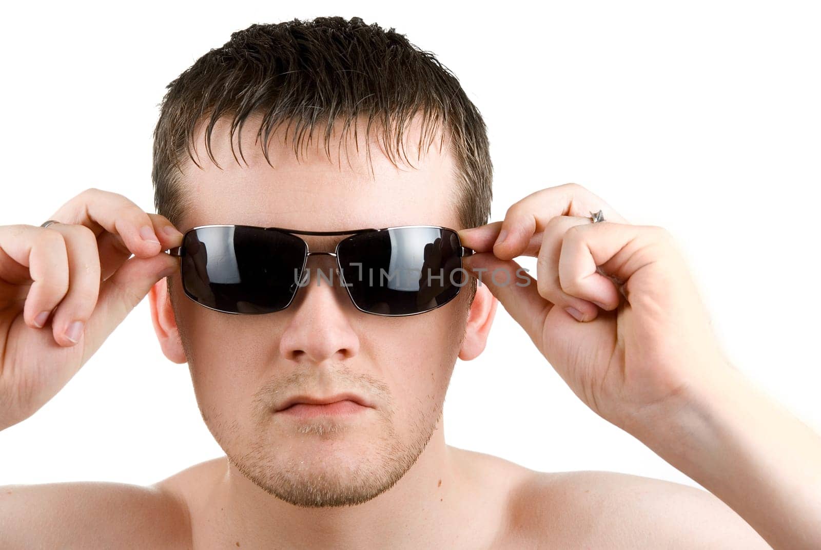 Close -up of young man portrait with sunglasses on white