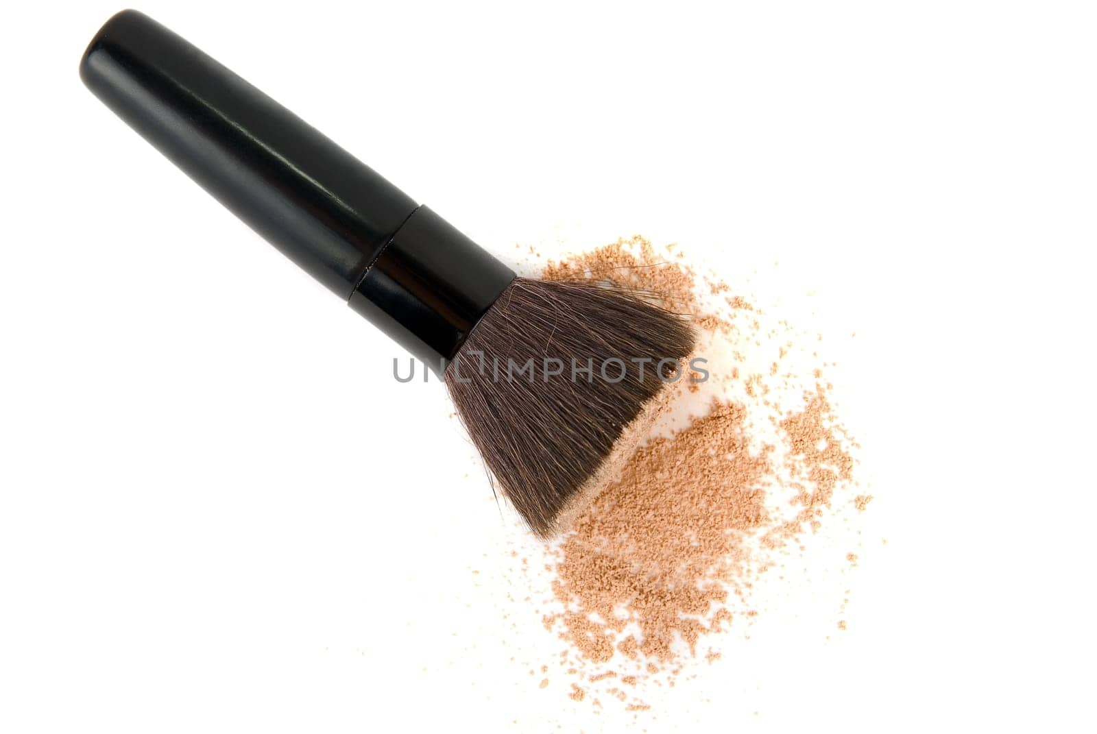 Cosmetic powder and black brush isolated