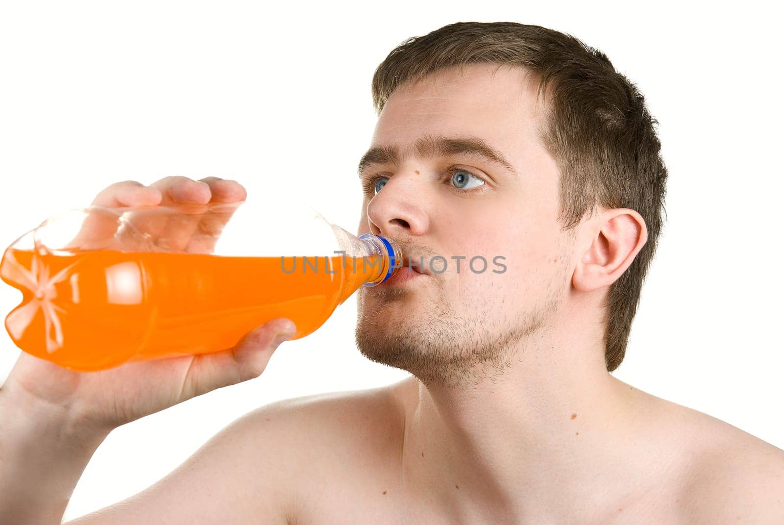 Man drinking orange juice isolated on white