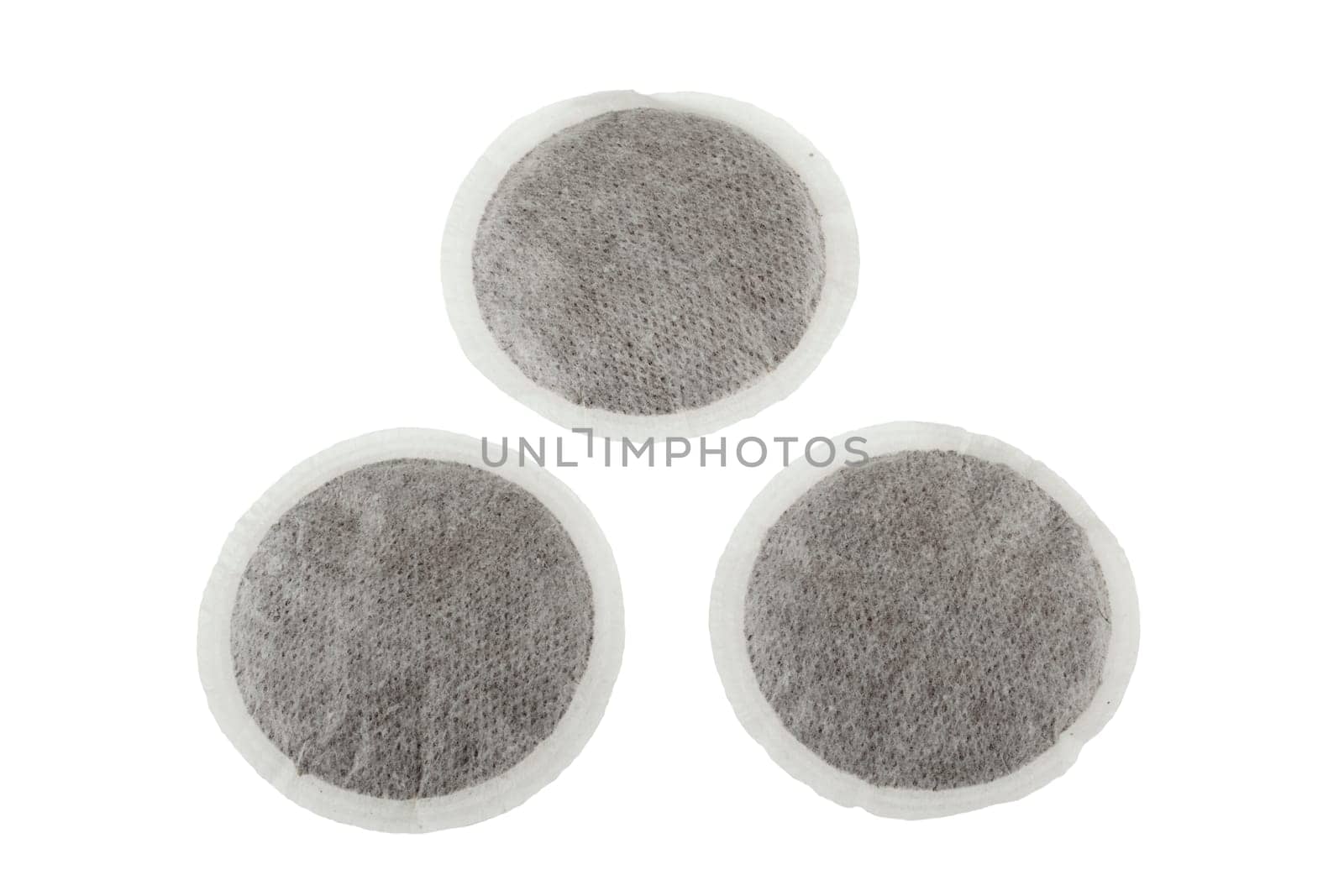group of three coffee pads isolated on white