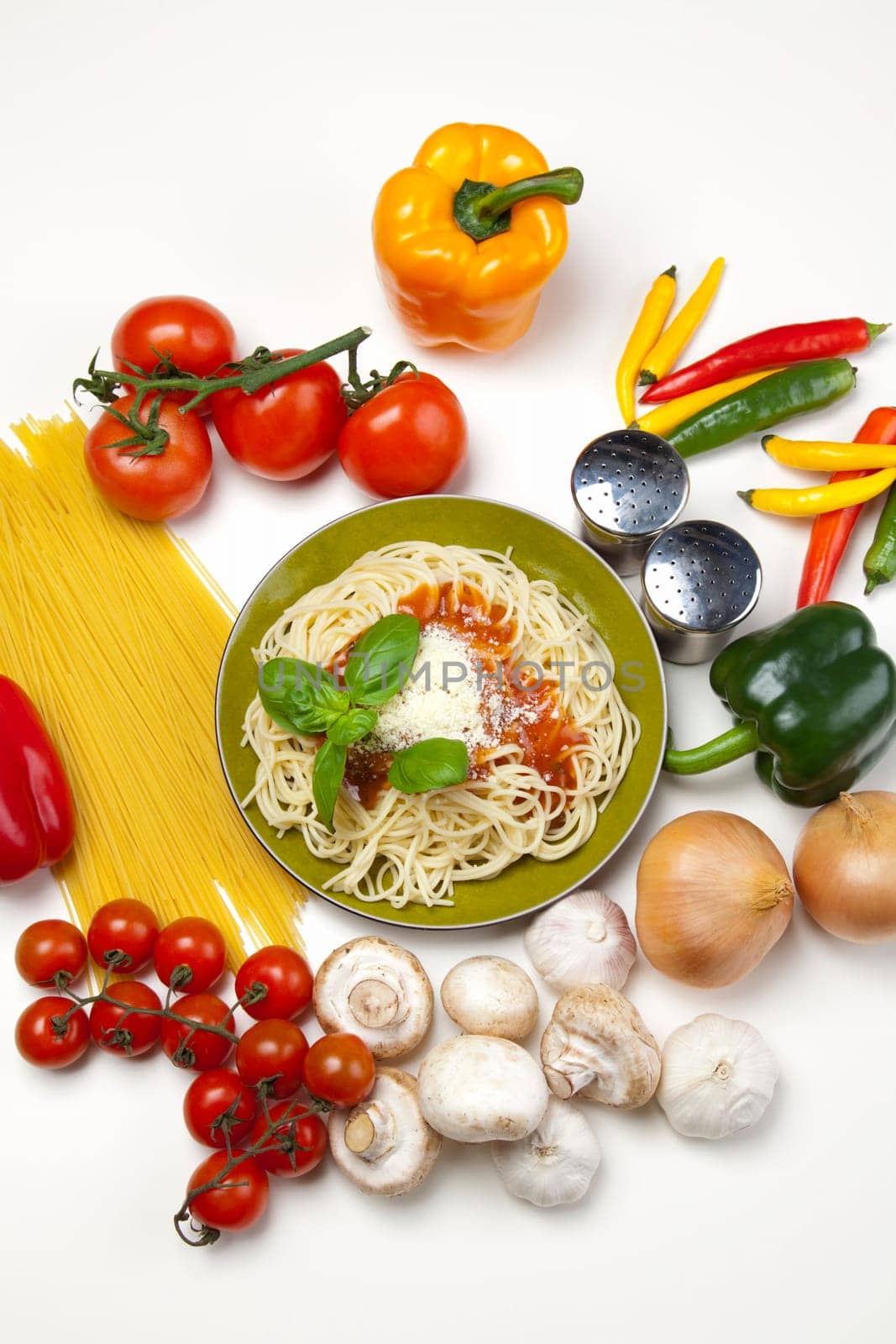 Pasta with tomato sauce basil and grated parmesan