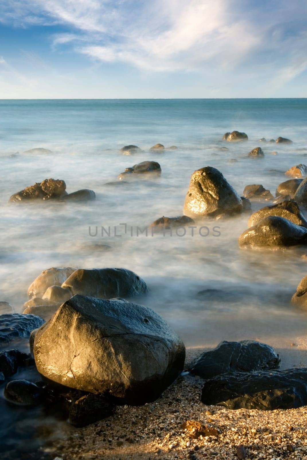 It is sunset of beautiful coral reef coastline.