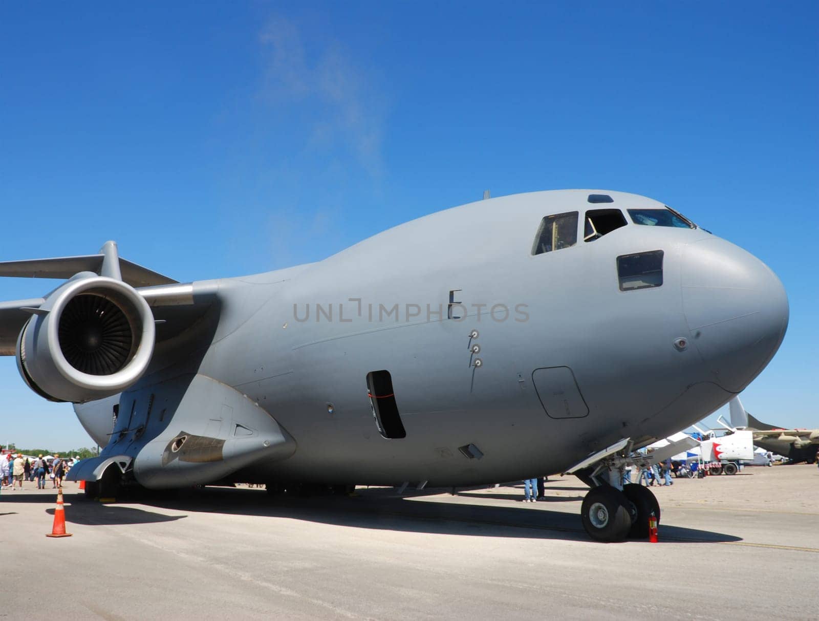 Big and heavy military transport airplane on the ground