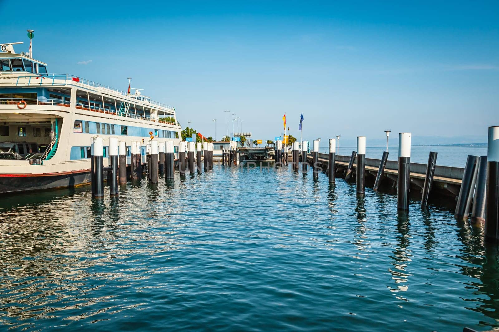 Ferry coming to port for loading or unloading by a port pier