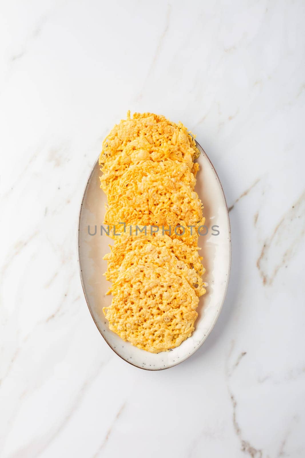 Parmesan cheese cracker chips. Grain Free Dippable Crispy Cheddar Cheese Chips, Keto and Low Carb.