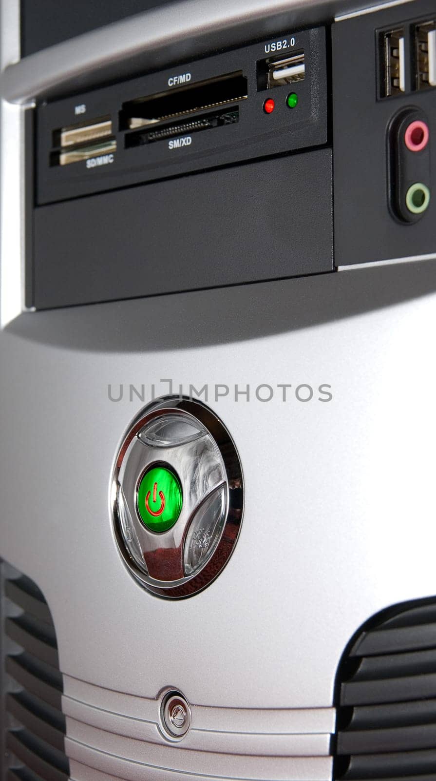 Close up of computer system box. Power and Reset button.