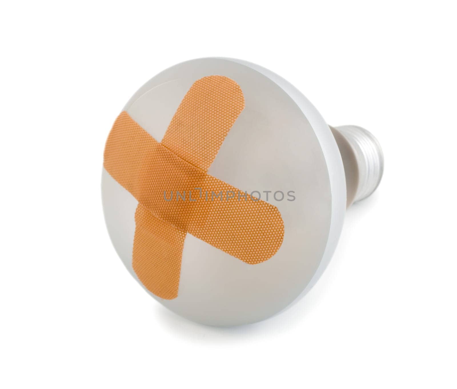 light bulb with band-aid isolated on white background