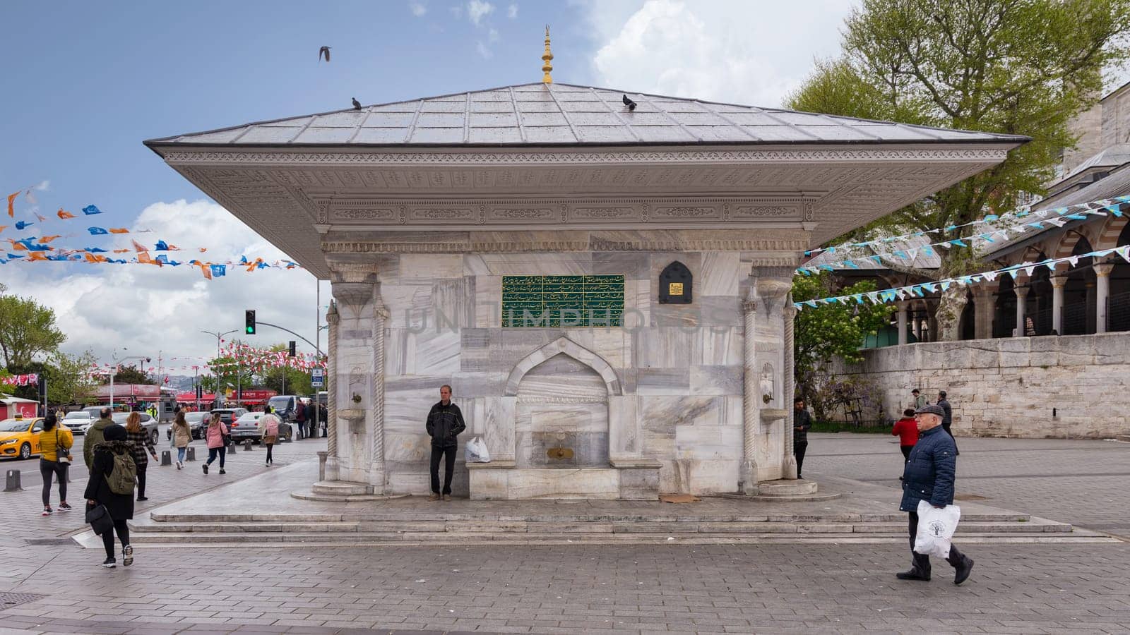 Istanbul, Turkey - May 5, 2023: Fountain of Ahmed III, or Ahmet Cesmesi, an 18th century public water fountain, or Sabil, built by Sultan Mahmud III, suited at Uskudar District