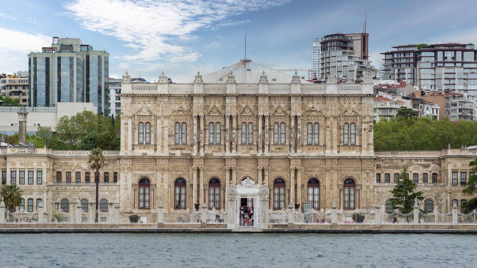 Istanbul, Turkey - May 10, 2023: View from Bosporus strait of Dolmabahce Palace, or Dolmabahce Sarayi, located in Besiktas district on the European coast