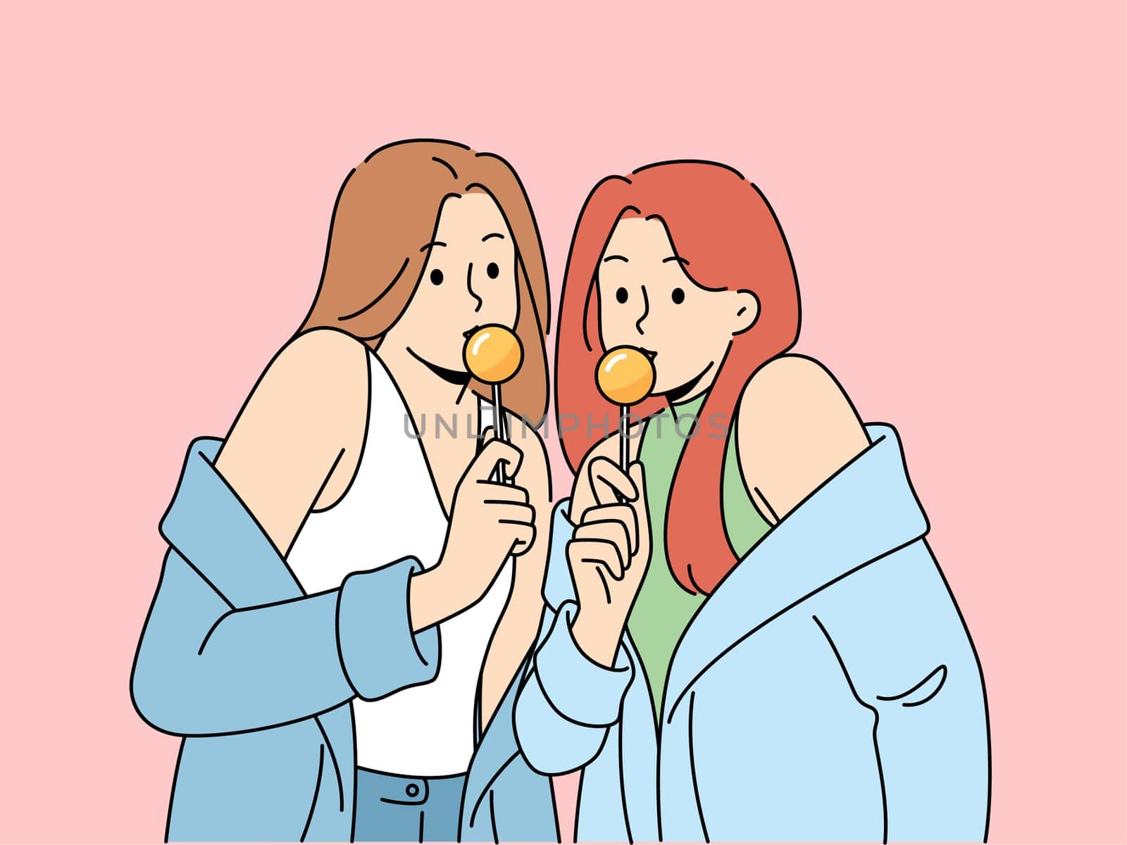 Two women with chupa chups in hands dressed in fashionable seductive clothes eat lollipops. Lovely girls in stylish jackets slung off shoulders to advertise new candies for teenagers