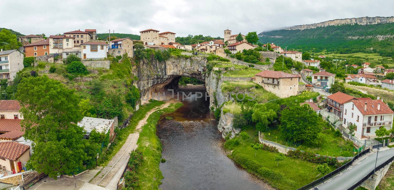 Beautiful view of Puentedey, a picturesque village with a natural bridge over the river. Merindades, Burgos, Spain, One of the Beautiful Towns