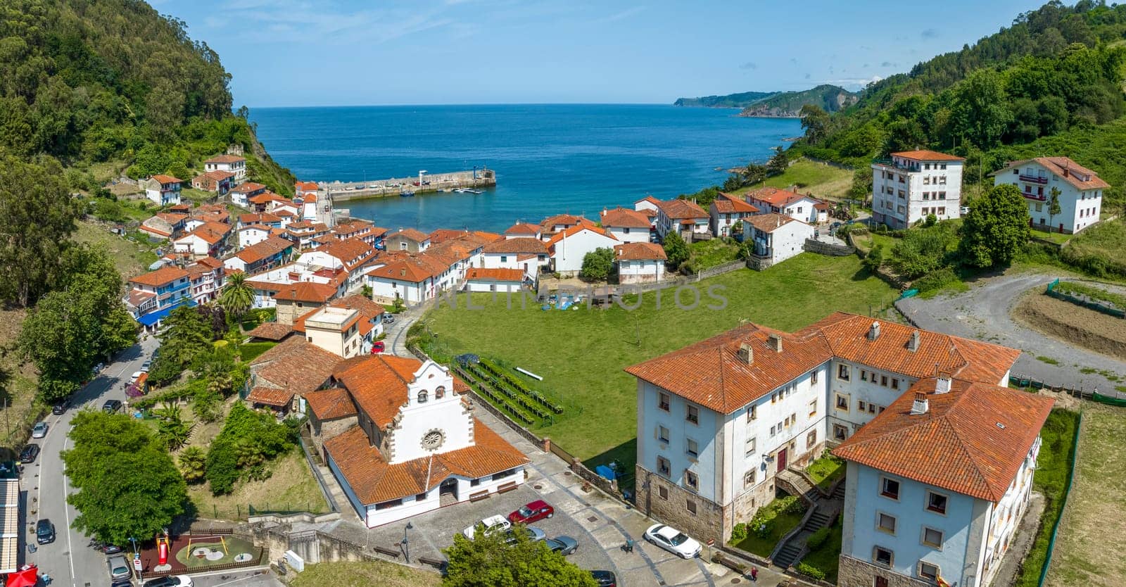 Aerial view panoramic Church of Iglesia San Miguel in Tazones Asturias Spain. named beautiful town of Spain