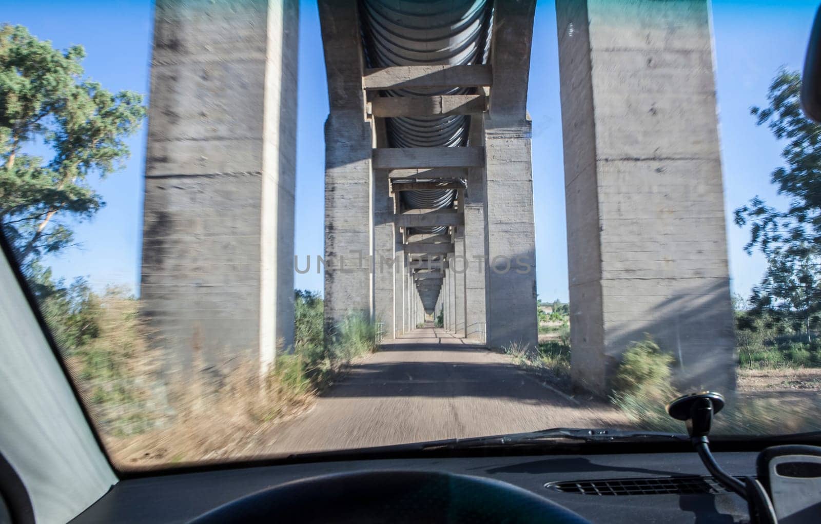 Driving under Acedera Aqueduct. Motion blurred shot