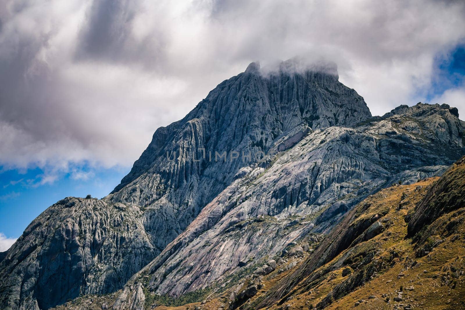 Andringitra national park, Haute Matsiatra region, Madagascar, beautiful mountain landscape with river in valley. Hiking in Andringitra mountains. Sunny day. Madagascar wilderness mountain landscape.