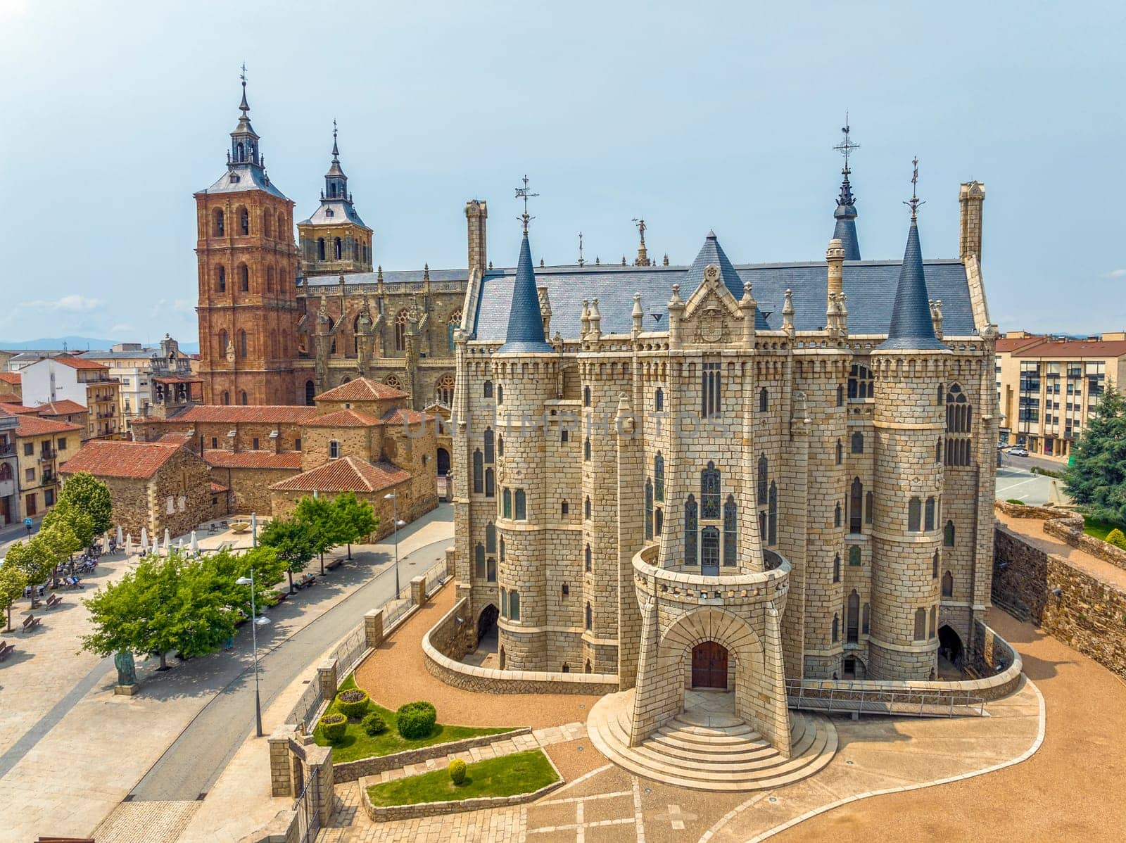 Episcopal Palace of Astorga, is a building by Catalan architect Antoni Gaudi in Astorga, in the background the Saint Maria Cathedral, Spain. Aerial view