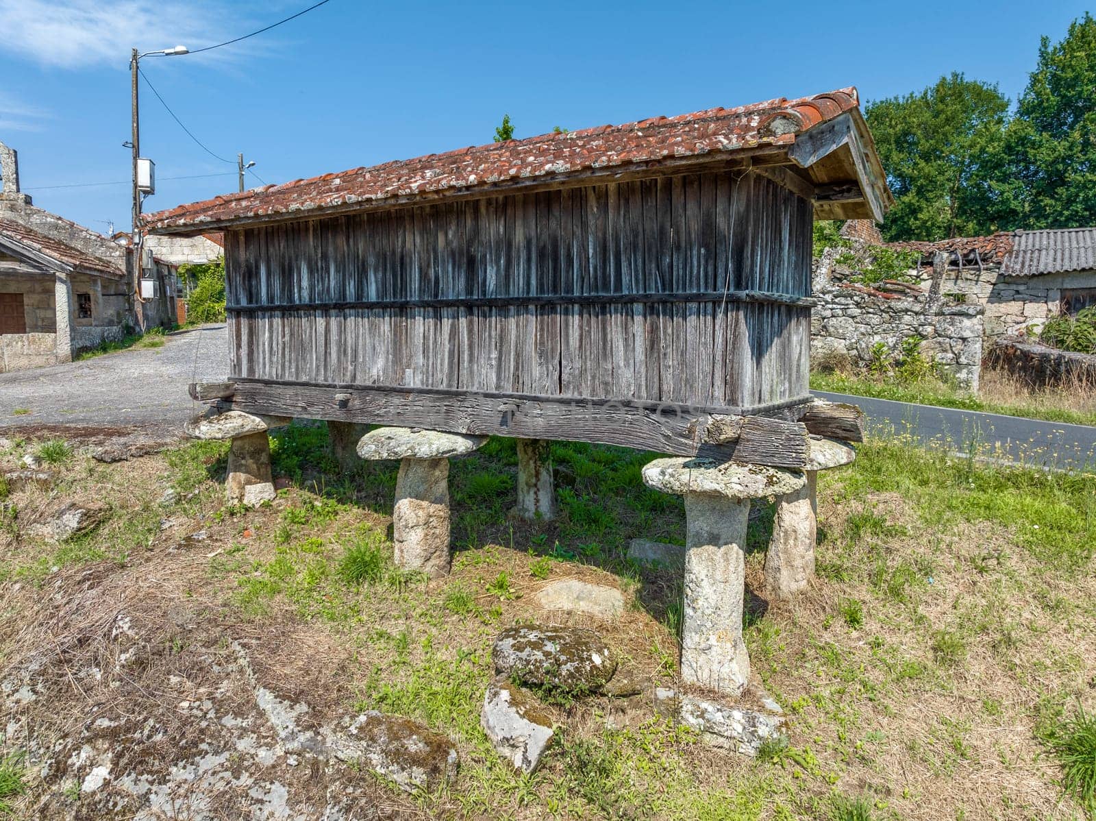 Typical Galician granary, separated from the ground with stone pilasters, in Santa Eufemia, Vilouchada Ourense., separated from the ground with stone pilasters, in Santa Eufemia, Vilouchada Ourense.