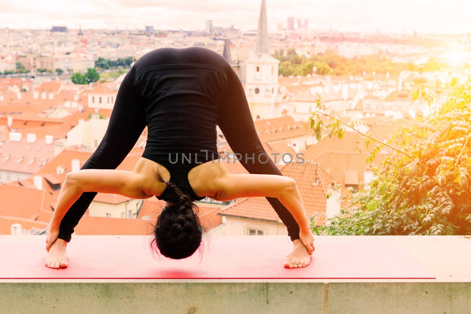 Mature asian woman doing yoga workout in a park. Concept of lifestyle fitness and healthy.
