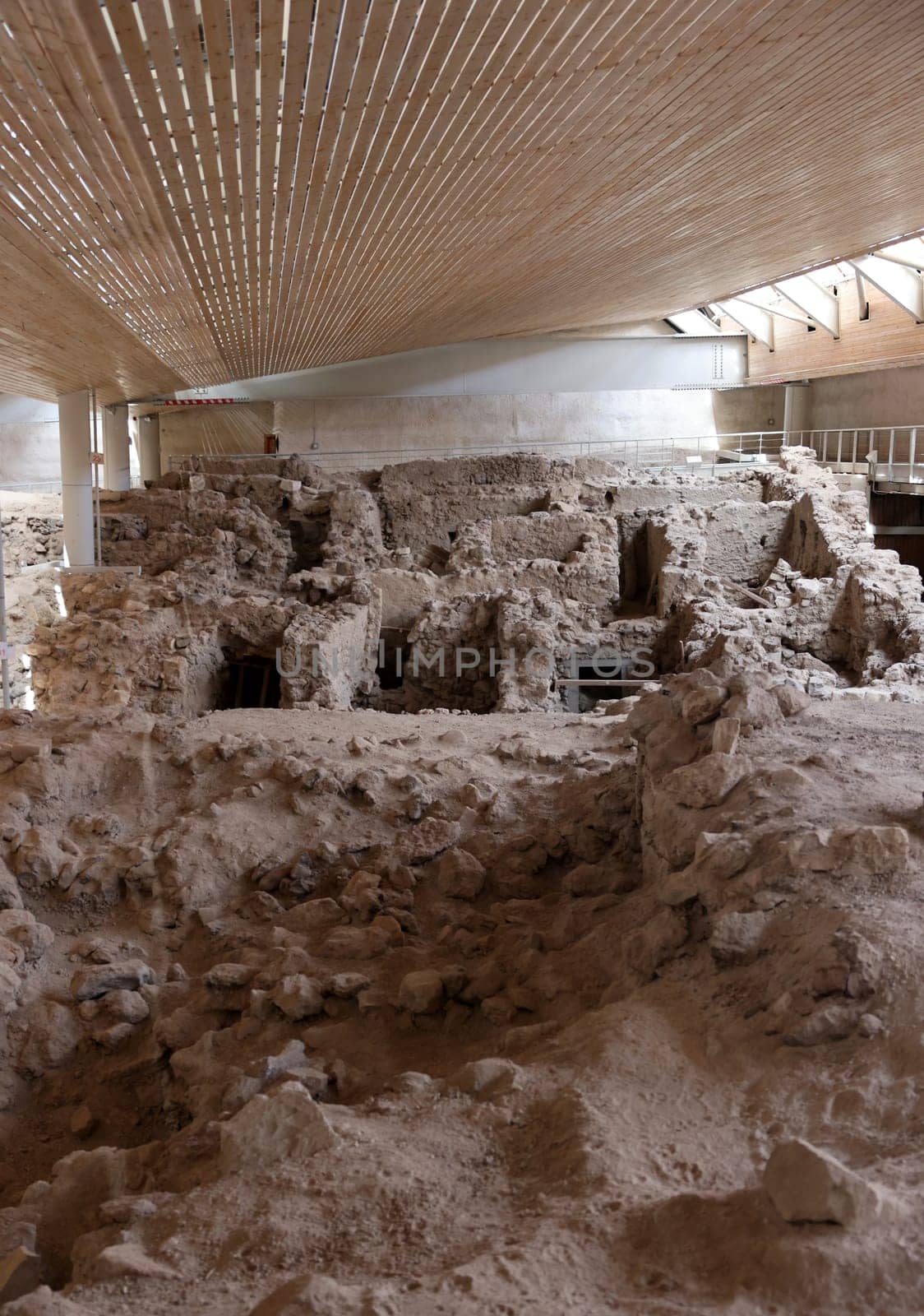 Santorini, Greece - July 01, 2021: Akrotiri, excavation site of a Minoan Bronze Age settlement on the Greek island of Santorini