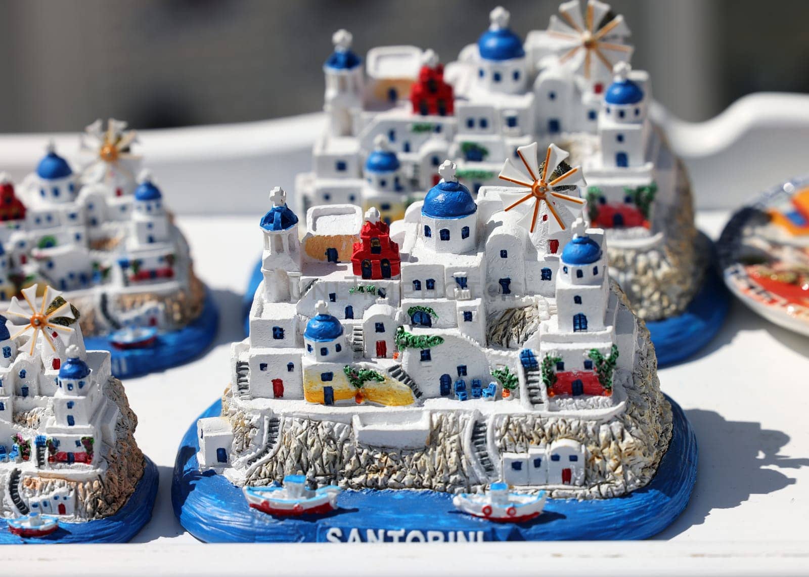 Oia  Santorini  Greece - July 3  2021: Souvenir shop display for tourists in Oia  Santorini  Island  Greece.