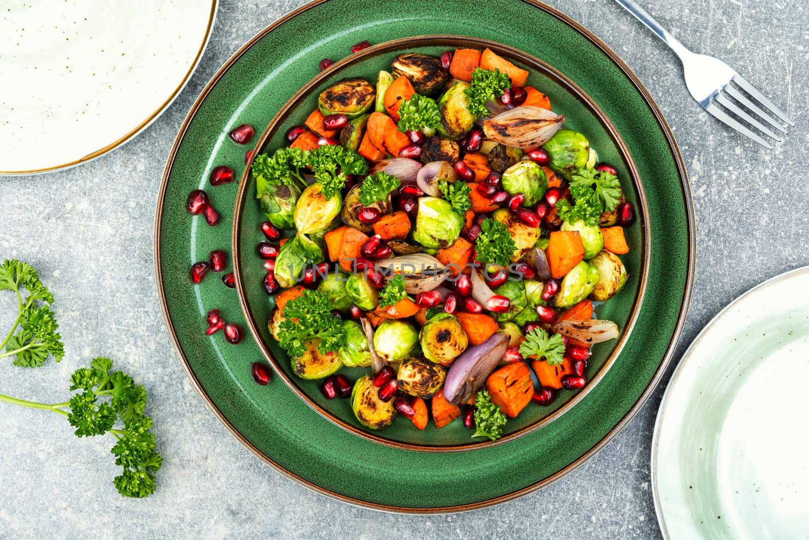 Warm salad with fried vegetables. Vegan food