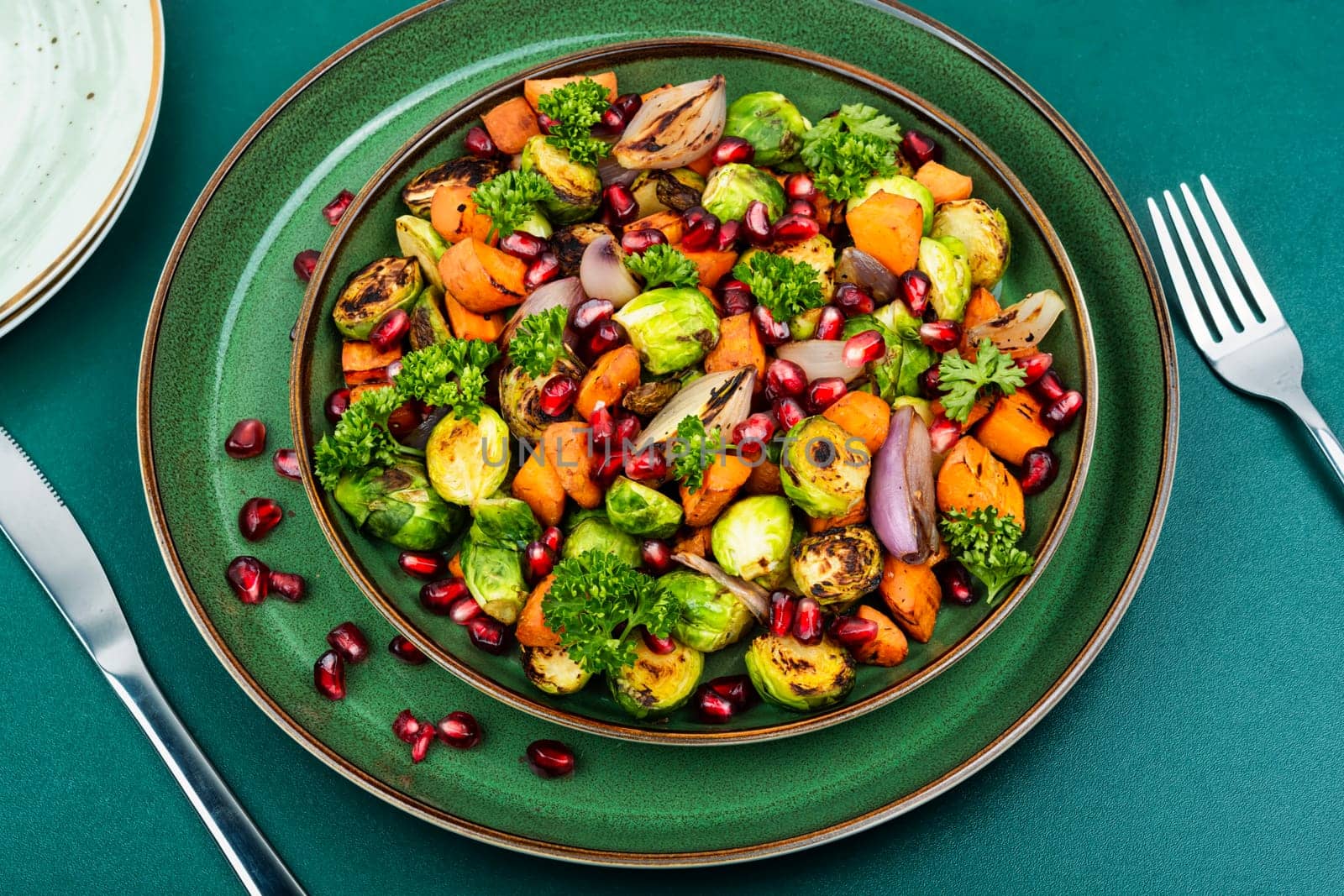 Warm salad with fried vegetables. Vegan food
