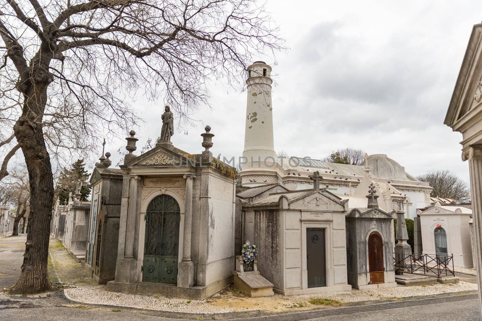 February 22, 2023 Lisbon, Portugal: crematorium and family crypts on the cemetery - Alto de Sao Joao Cemetery. Mid shot