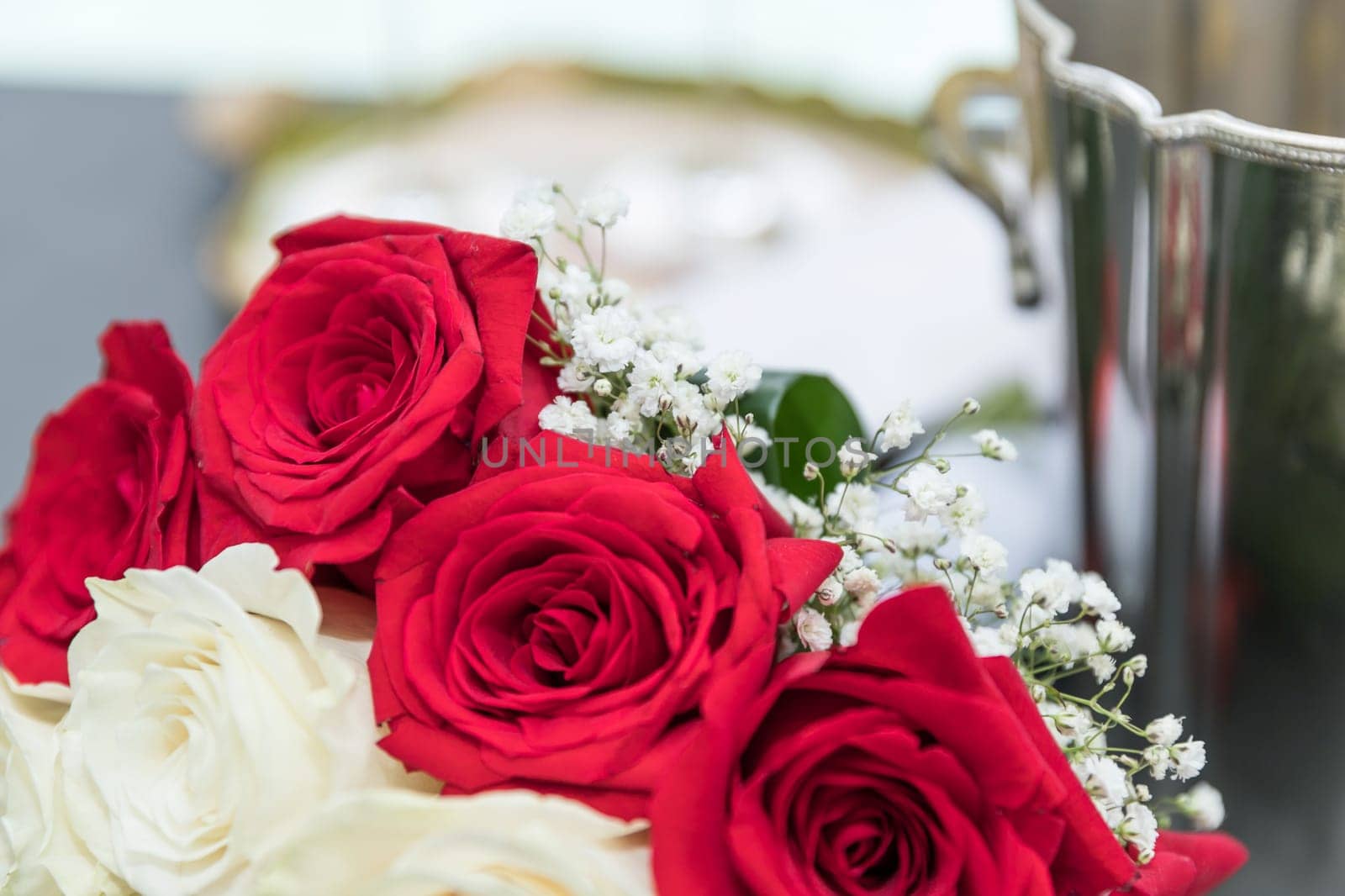Flower bouquet of marriage, on blurred background. Party, event.