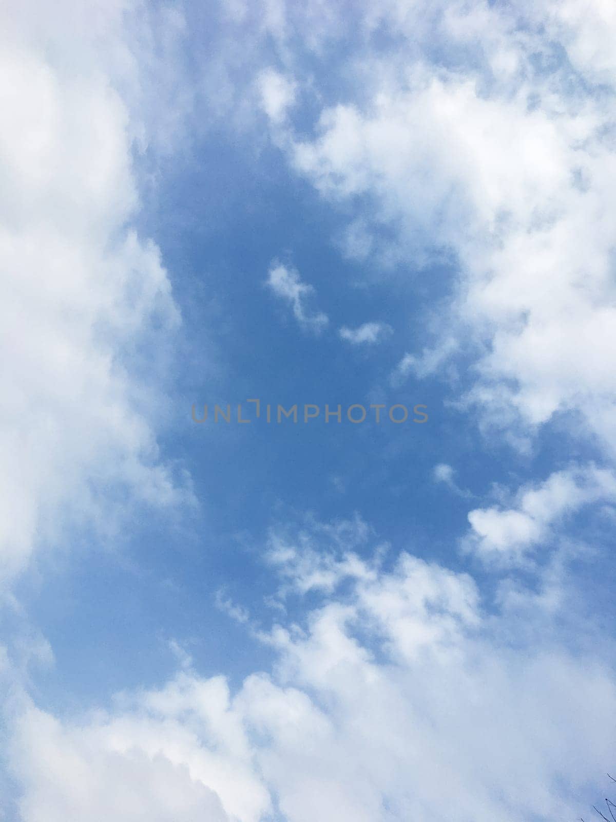 Blue sky background with white clouds