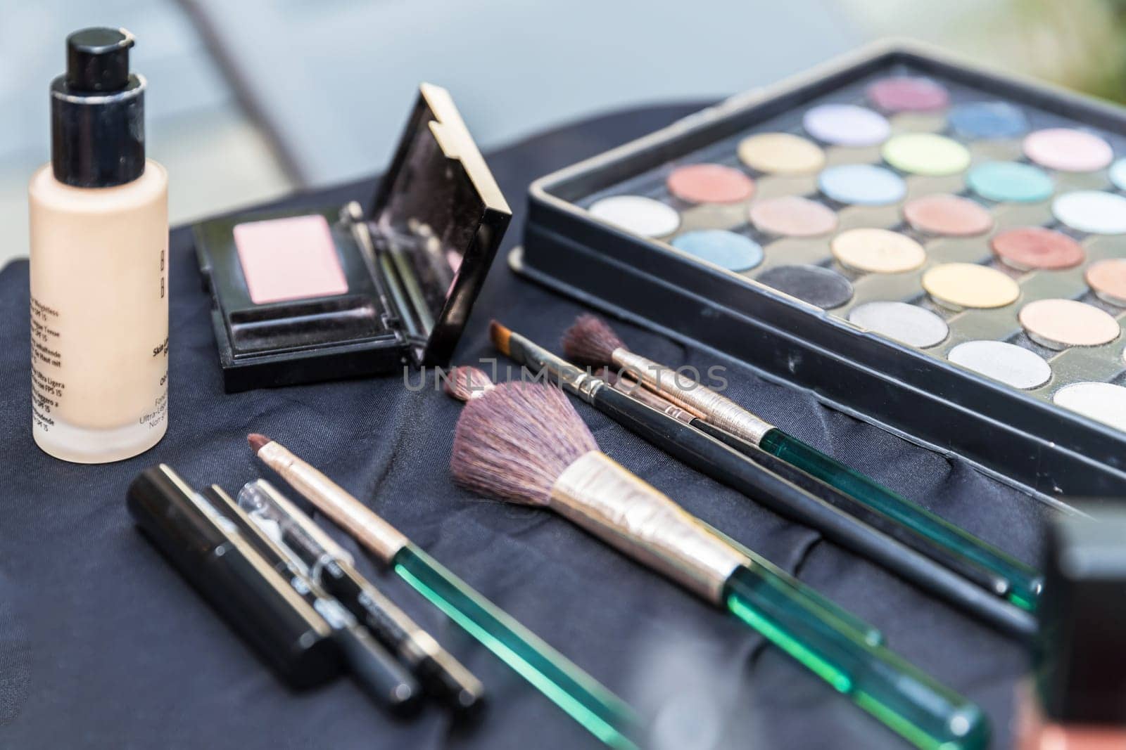 Makeup brushes, cosmetic, tools of a makeup artist ready to be used. Concepts.