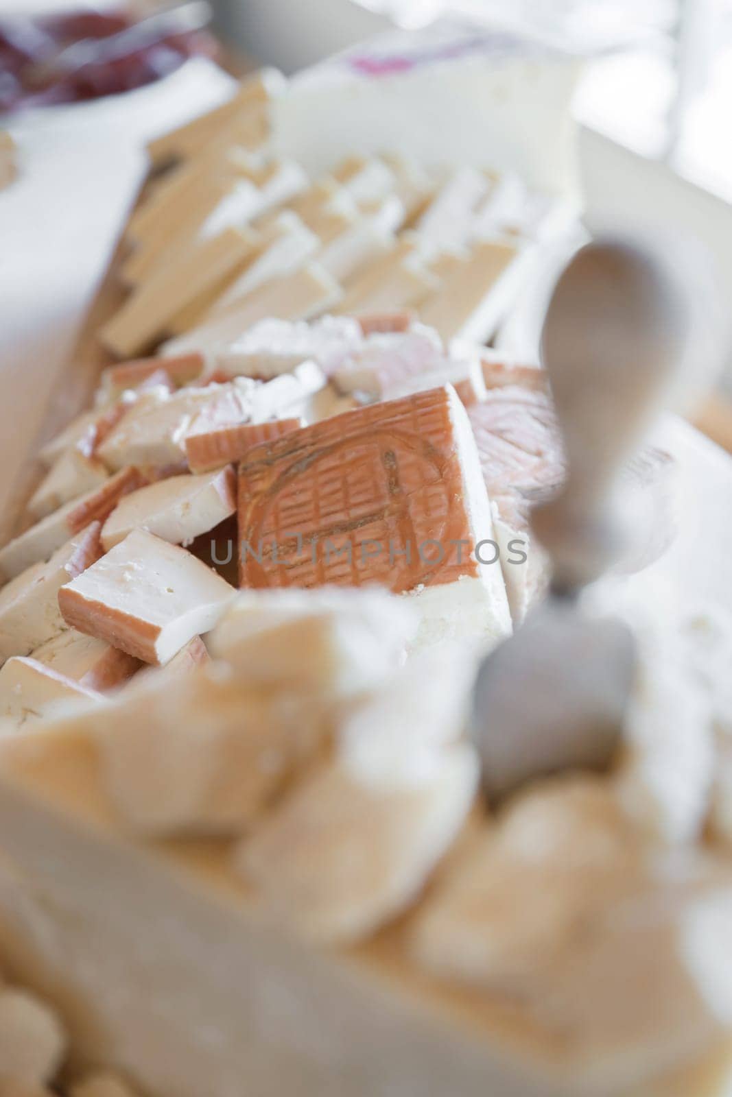 Cheese row prepared for party or event. Selective focus.