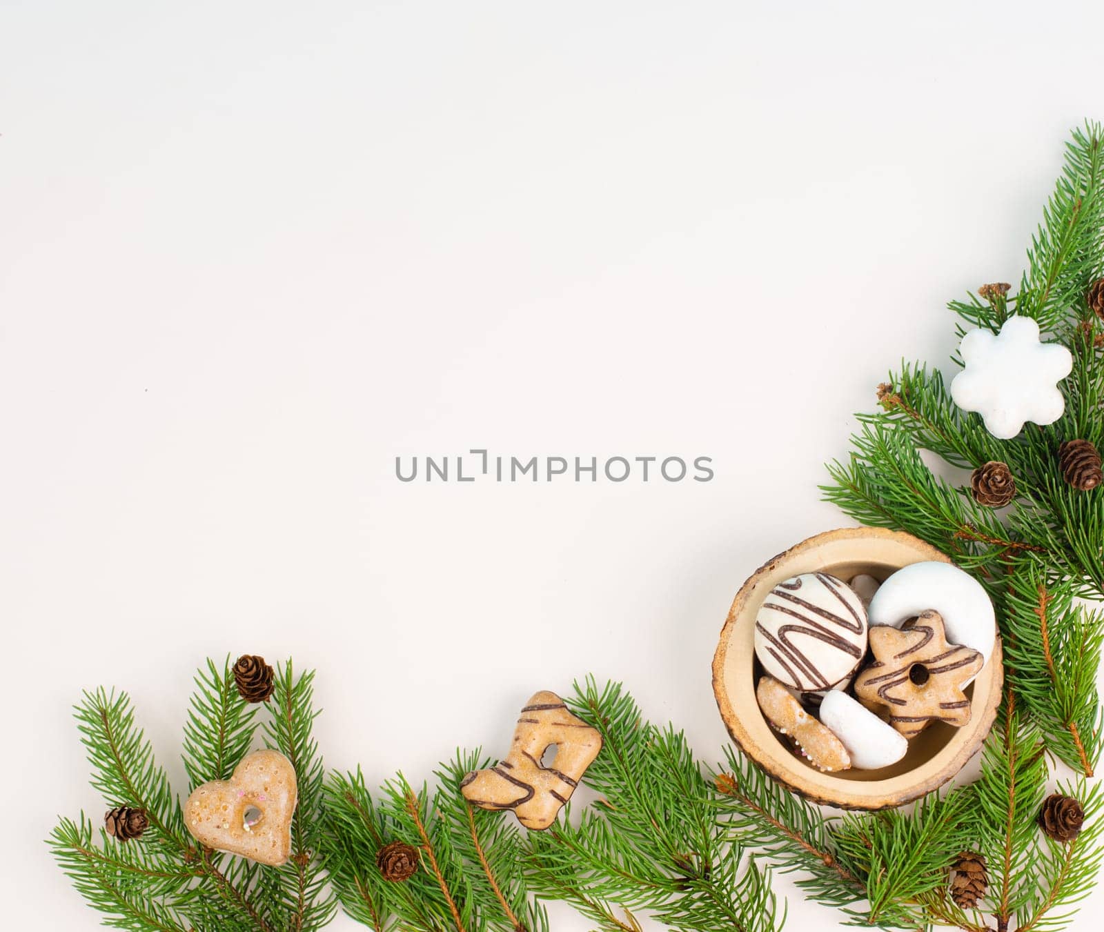 Nurnberg elisen gingerbread mix, traditional german christmas sweets with fir branches and pine cones, holiday background with copy space