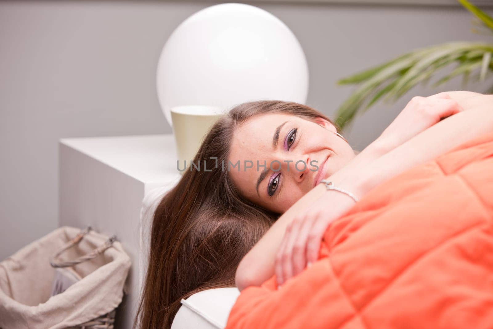 pretty girl going to sleep on her couch