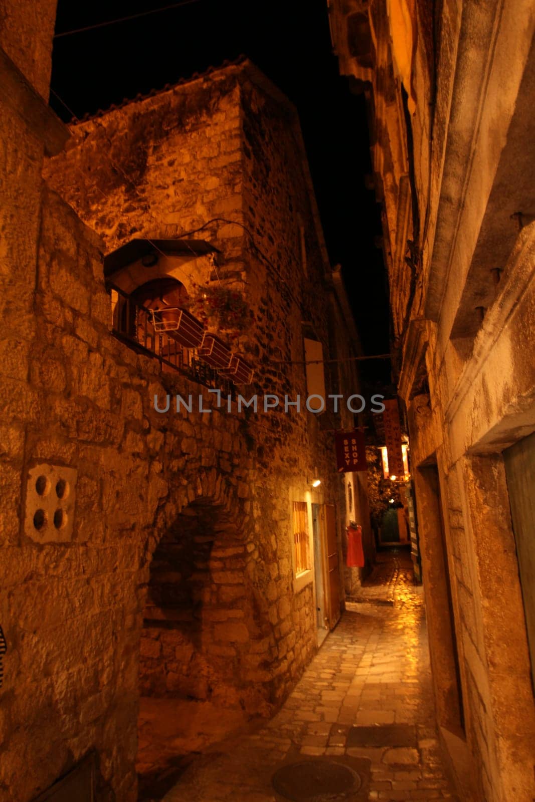 Little narrow mediterranean alley in downtown Trogir, Croatia