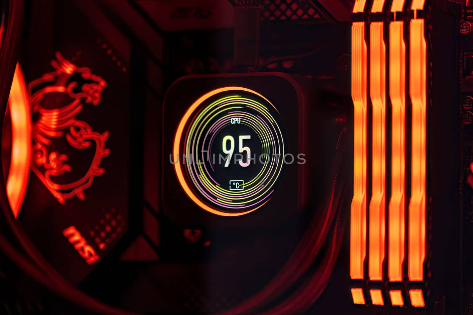 Milan, Italy 19 august 2023: A close-up of a CPU's liquid cooling system under high temperature inside a top-tier gaming computer.