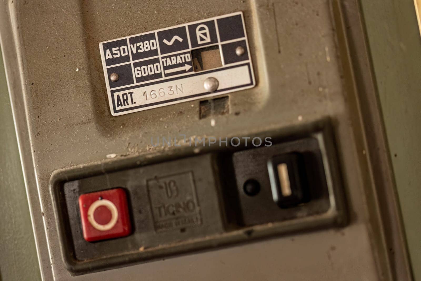 Milan, Italy 19 august 2023: Close-up of aged, obsolete high-voltage electrical switches with a nostalgic industrial feel.