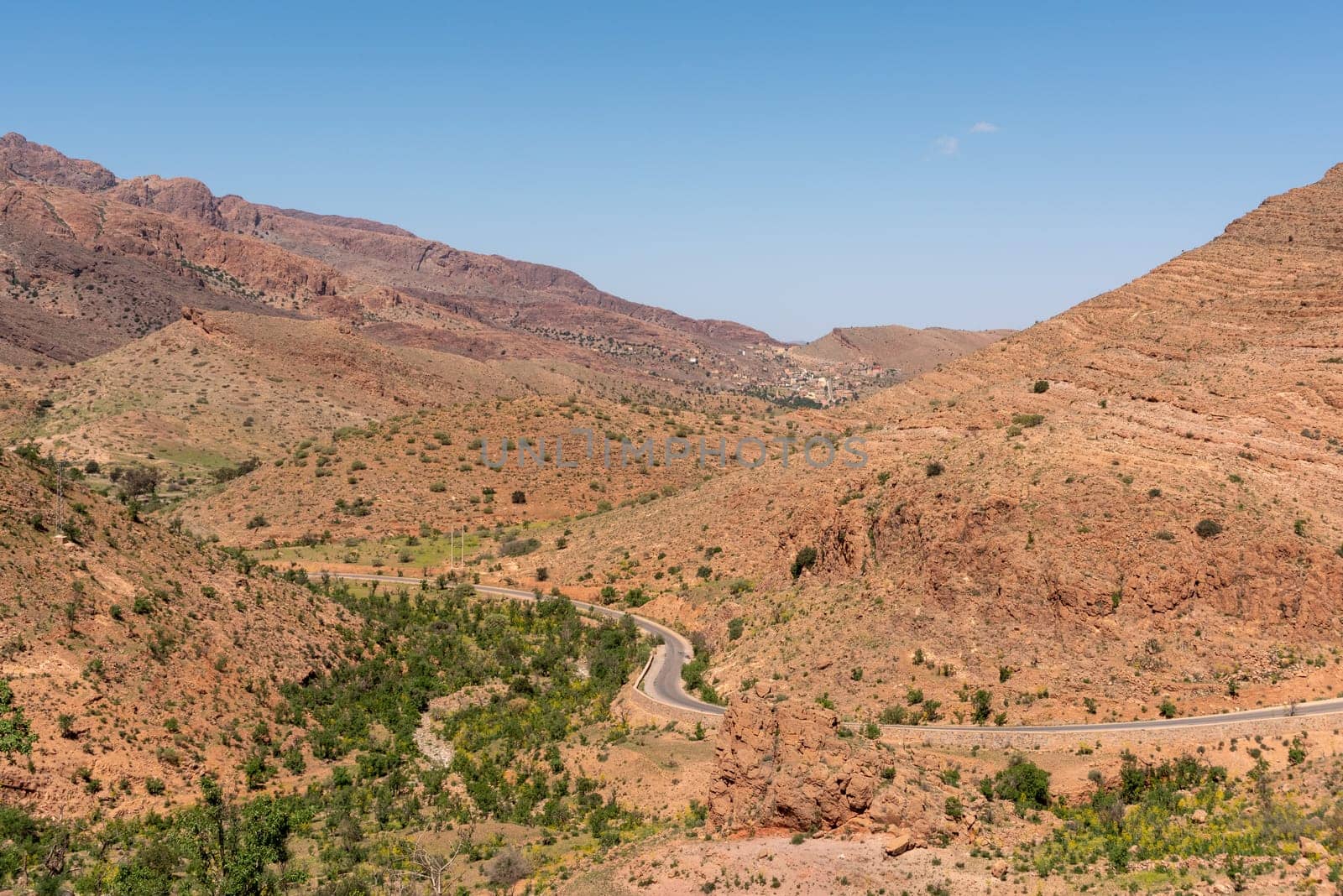 A road winding through a village in the Moroccan Anti-Atlas mountains