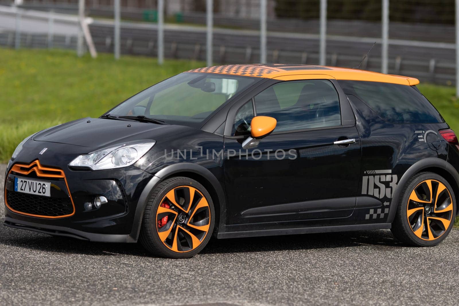 11-20-2022 PORTUGAL, LISBON: Caterham festival - black car with orange discs prepared for racing. Mid shot