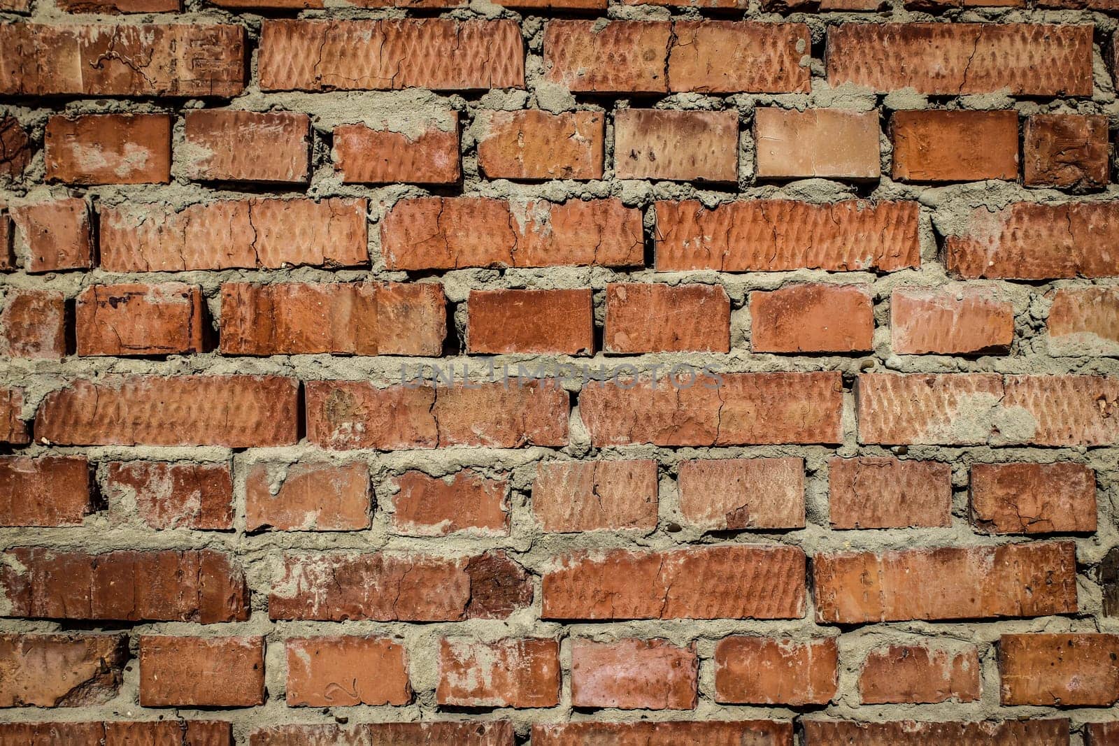 background texture of brick, with remnants of plaster