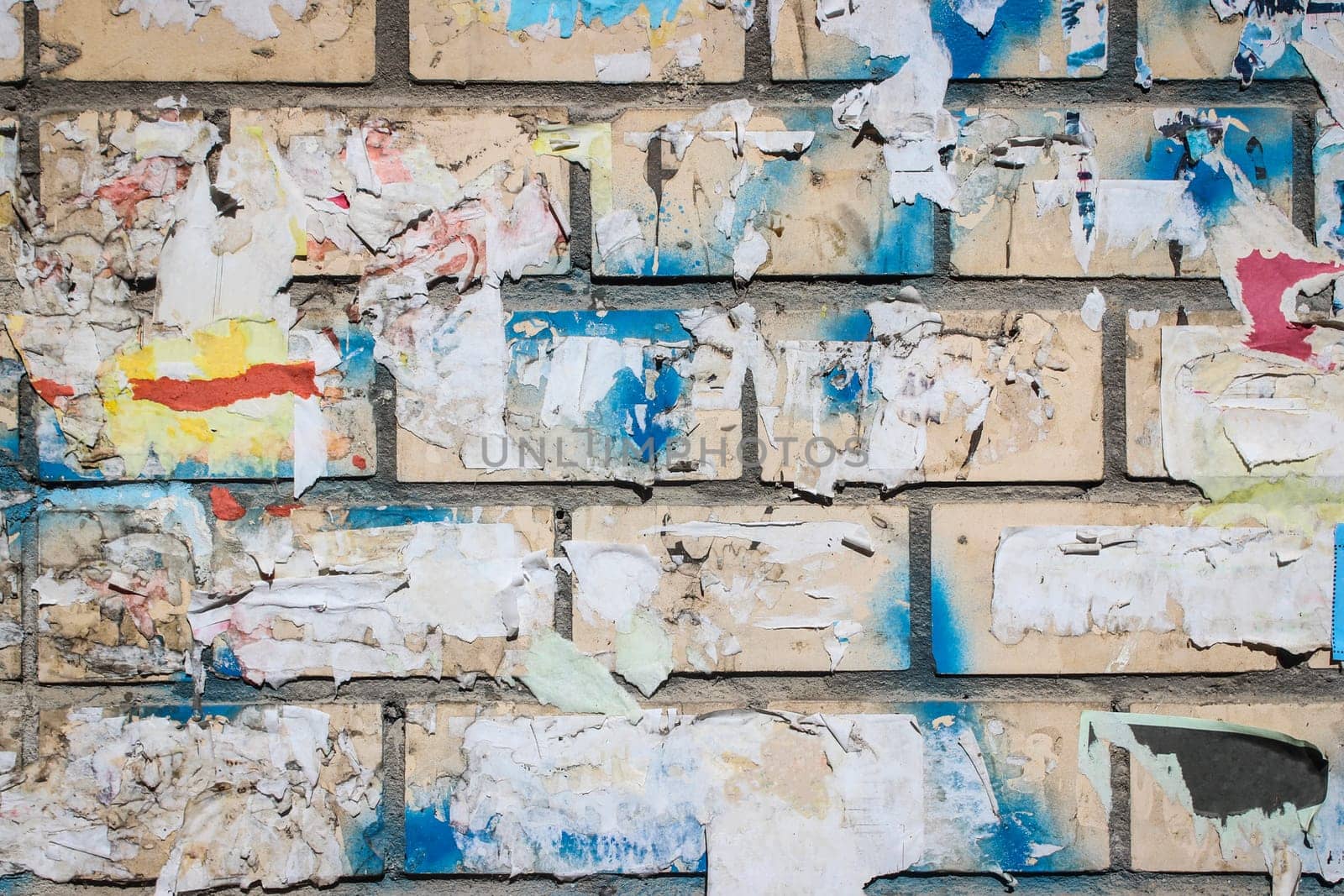 wall background of abstract texture of remnants of advertising Posters