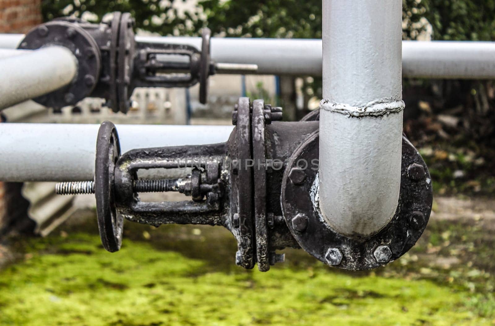 Closeup shot of big rusted valve industrial site