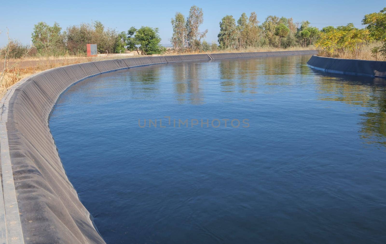 Orellana Irrigation canal crossing Vegas Altas del Guadiana, Badajoz, Extremadura, Spain