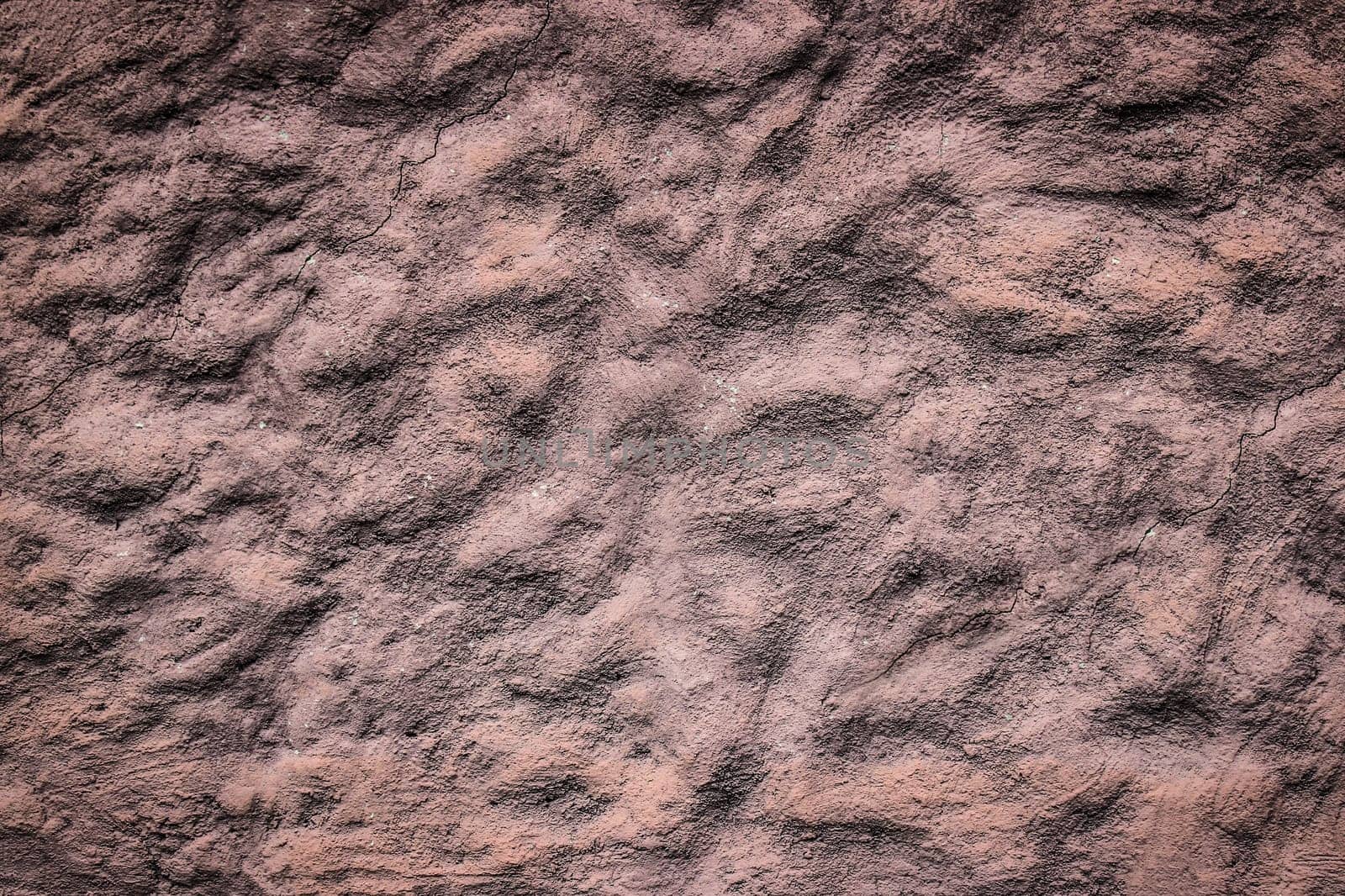 Brown Art Wall Texture, relief decorative plaster with an imprint of various plants