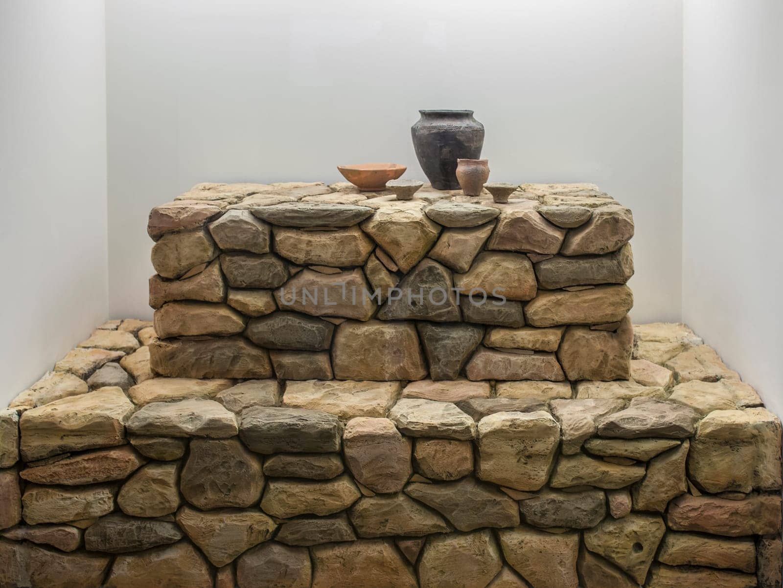 Almendralejo, Spain - Jan 26th, 201: Pre-Roman altar with receptacles for wine. Wine Science Museum of Almendralejo, Spain